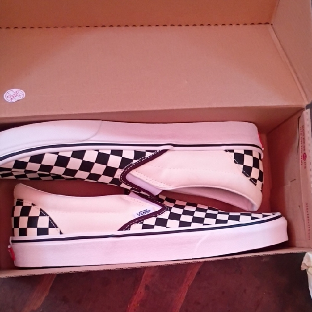 Vans Black and White Checkerboard Slip-Ons